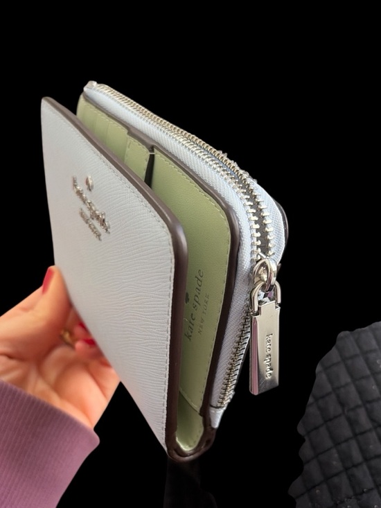 kate spade Handbags - kate spade light gray and olive zip card case wallet with gold logo